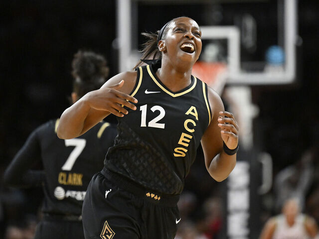 LAS VEGAS, NV - MAY 28: Chelsea Gray #12 of the Las Vegas Aces celebrates during the game against the Minnesota Lynx on May 28, 2023 at Michelob ULTRA Arena in Las Vegas, Nevada. Mandatory Copyright Notice: Copyright 2023 NBAE