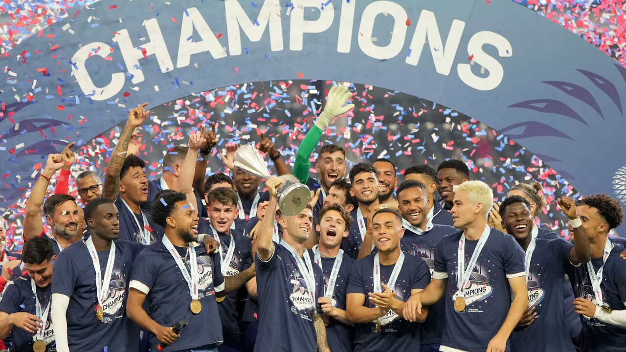 LAS VEGAS, NEVADA - JUNE 18: Christian Pulisic #10 of the United States lifts the trophy as United States players celebrate winning the Concacaf Nations League tournament during the 2023 CONCACAF Nations League Final against Canada at Allegiant Stadium on June 18, 2023 in Las Vegas, Nevada.
