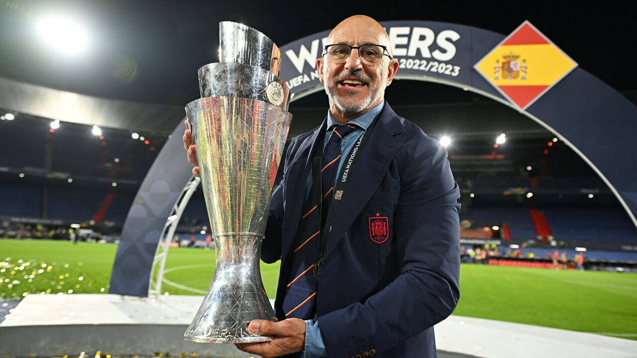 ROTTERDAM, NETHERLANDS - JUNE 18: Luis de la Fuente, Head Coach of Spain, poses for a photograph with the UEFA Nations League trophy after the team's victory in the UEFA Nations League 2022/23 final match between Croatia and Spain at De Kuip on June 18, 2023 in Rotterdam, Netherlands.