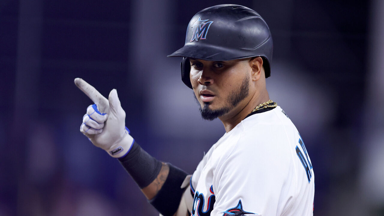 MIAMI, FLORIDA - JUNE 19: Luis Arraez #3 of the Miami Marlins reacts after hitting a single against the Toronto Blue Jays during the seventh inning at loanDepot park on June 19, 2023 in Miami, Florida.