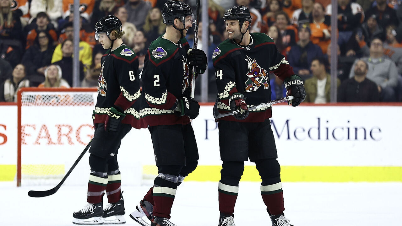PHILADELPHIA, PENNSYLVANIA - JANUARY 05: Patrik Nemeth #2 and Zack Kassian #44 of the Arizona Coyotes speak during the first period against the Philadelphia Flyers at Wells Fargo Center on January 05, 2023 in Philadelphia, Pennsylvania.