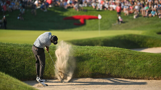 CROMWELL, CT - JUNE 26: Sahith Theegala hits his second shot from the bunker along the 18th hole during the final round of the Travelers Championship at TPC River Highlands on June 26, 2022 in Cromwell, Connecticut.