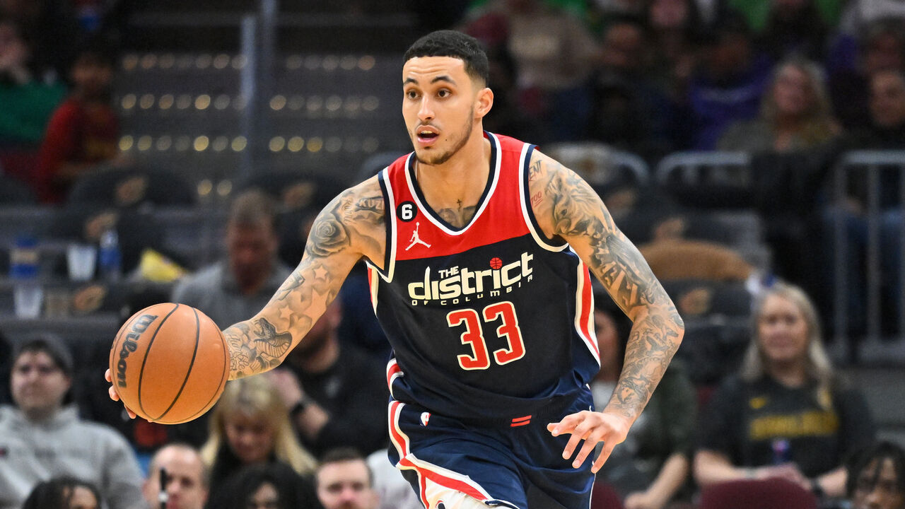 CLEVELAND, OHIO - MARCH 17: Kyle Kuzma #33 of the Washington Wizards brings the ball up court during the third quarter of the game against the Cleveland Cavaliers at Rocket Mortgage Fieldhouse on March 17, 2023 in Cleveland, Ohio. The Cavaliers defeated the Wizards 117-94.