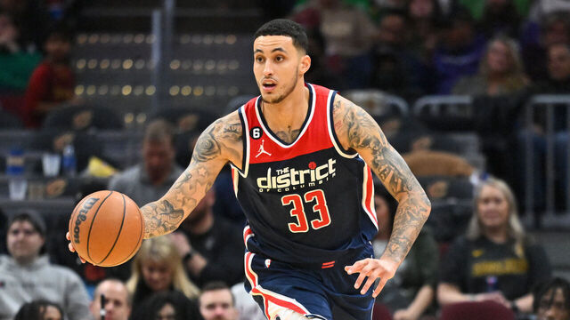 CLEVELAND, OHIO - MARCH 17: Kyle Kuzma #33 of the Washington Wizards brings the ball up court during the third quarter of the game against the Cleveland Cavaliers at Rocket Mortgage Fieldhouse on March 17, 2023 in Cleveland, Ohio. The Cavaliers defeated the Wizards 117-94.