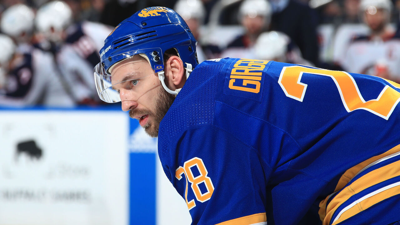 BUFFALO, NY - FEBRUARY 28: Zemgus Girgensons #28 of the Buffalo Sabres prepares for a faceoff during an NHL game against the Columbus Blue Jackets on February 28, 2023 at KeyBank Center in Buffalo, New York.