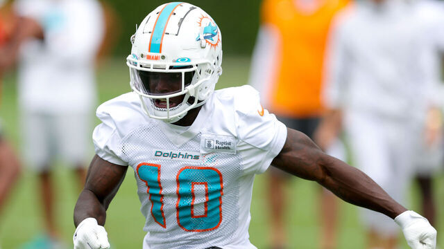 MIAMI GARDENS, FLORIDA - JUNE 06: Tyreek Hill #10 of the Miami Dolphins takes part in a drill during practice at Baptist Health Training Complex on June 06, 2023 in Miami Gardens, Florida.