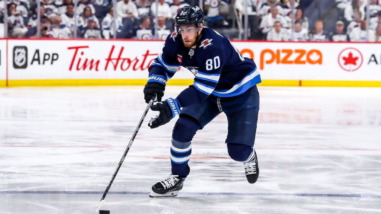 WINNIPEG, CANADA - APRIL 24: Pierre-Luc Dubois #80 of the Winnipeg Jets plays the puck down the ice during second period action against the Vegas Golden Knights in Game Four of the First Round of the 2023 Stanley Cup Playoffs at the Canada Life Centre on April 24, 2023 in Winnipeg, Manitoba, Canada. The Knights defeated the Jets 4-2 and lead the series 3-1.