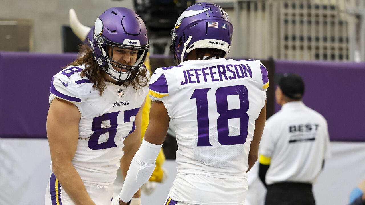 MINNEAPOLIS, MN - DECEMBER 24: T.J. Hockenson #87 of the Minnesota Vikings celebrates his touchdown against the New York Giants with teammate Justin Jefferson #18 in the first quarter of the game at U.S. Bank Stadium on December 24, 2022 in Minneapolis, Minnesota. The Vikings defeated the Giants 27-24.