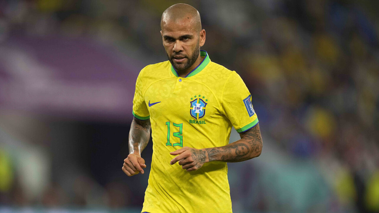 DOHA, QATAR - DECEMBER 05: Dani Alves looks on during the FIFA World Cup Qatar 2022 Round of 16 match between Brazil and South Korea at Stadium 974 on December 5, 2022 in Doha, Qatar.