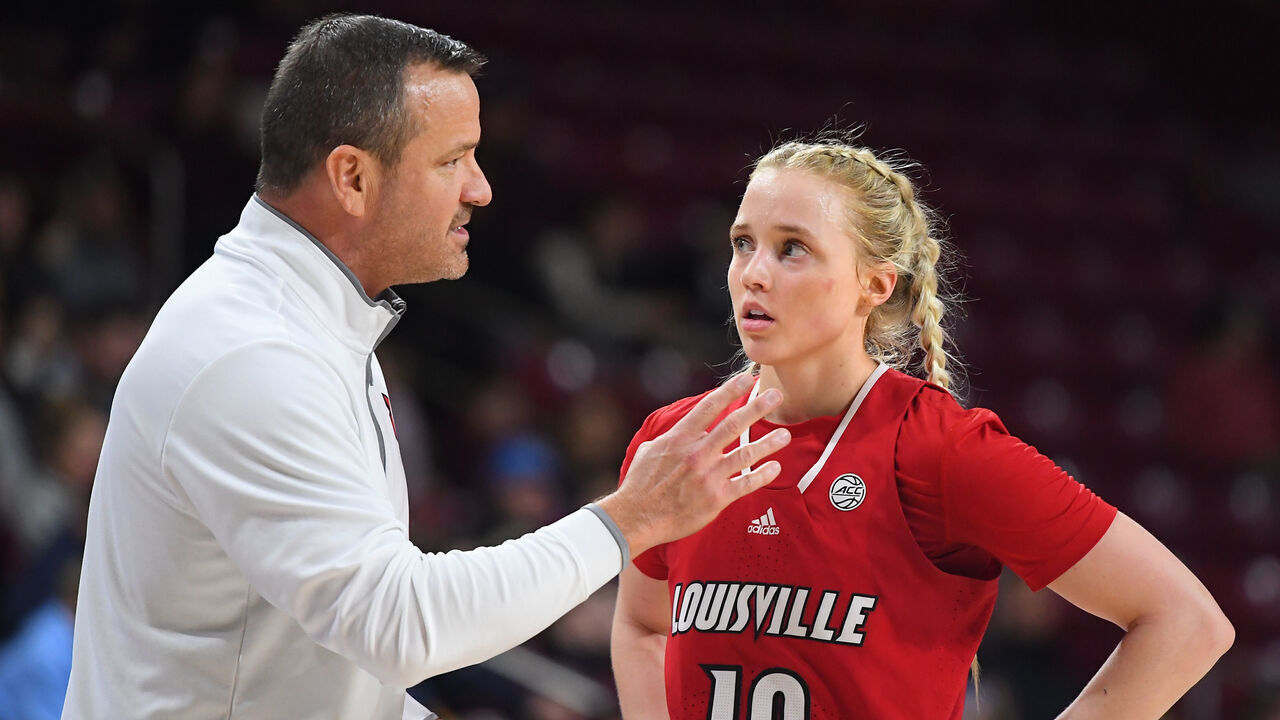 CHESTNUT HILL, MA - FEBRUARY 19: Louisville Cardinals head coach Jeff Walz gives instructions to Louisville Cardinals guard Hailey Van Lith (10) during a women's college basketball game between the Louisville Cardinals and the Boston College Eagles on February 19, 2023, at Conte Forum in Chestnut Hill, MA.
