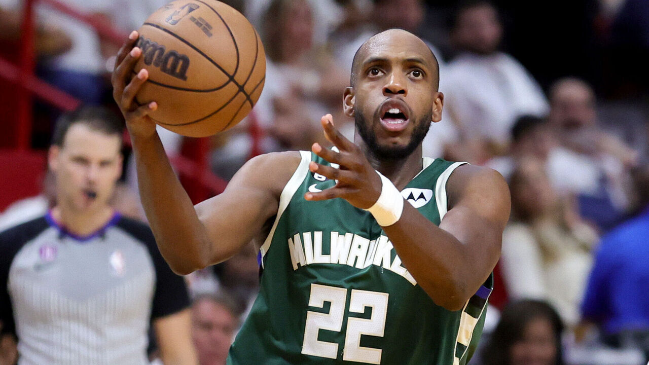 MIAMI, FLORIDA - APRIL 24: Khris Middleton #22 of the Milwaukee Bucks shoots the ball against the Miami Heat during the third quarter in Game Four of the Eastern Conference First Round Playoffs at Kaseya Center on April 24, 2023 in Miami, Florida.