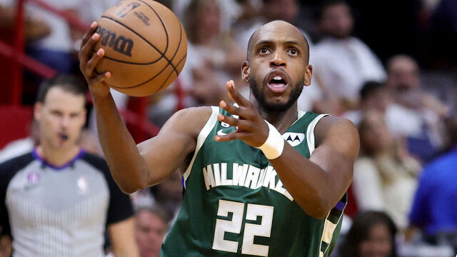 MIAMI, FLORIDA - APRIL 24: Khris Middleton #22 of the Milwaukee Bucks shoots the ball against the Miami Heat during the third quarter in Game Four of the Eastern Conference First Round Playoffs at Kaseya Center on April 24, 2023 in Miami, Florida.