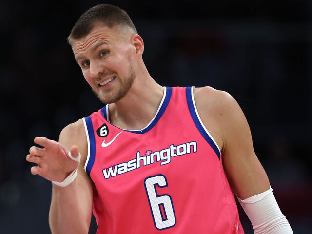 WASHINGTON, DC - MARCH 28: Kristaps Porzingis #6 of the Washington Wizards gestures against the Boston Celtics during the second half at Capital One Arena on March 28, 2023 in Washington, DC.