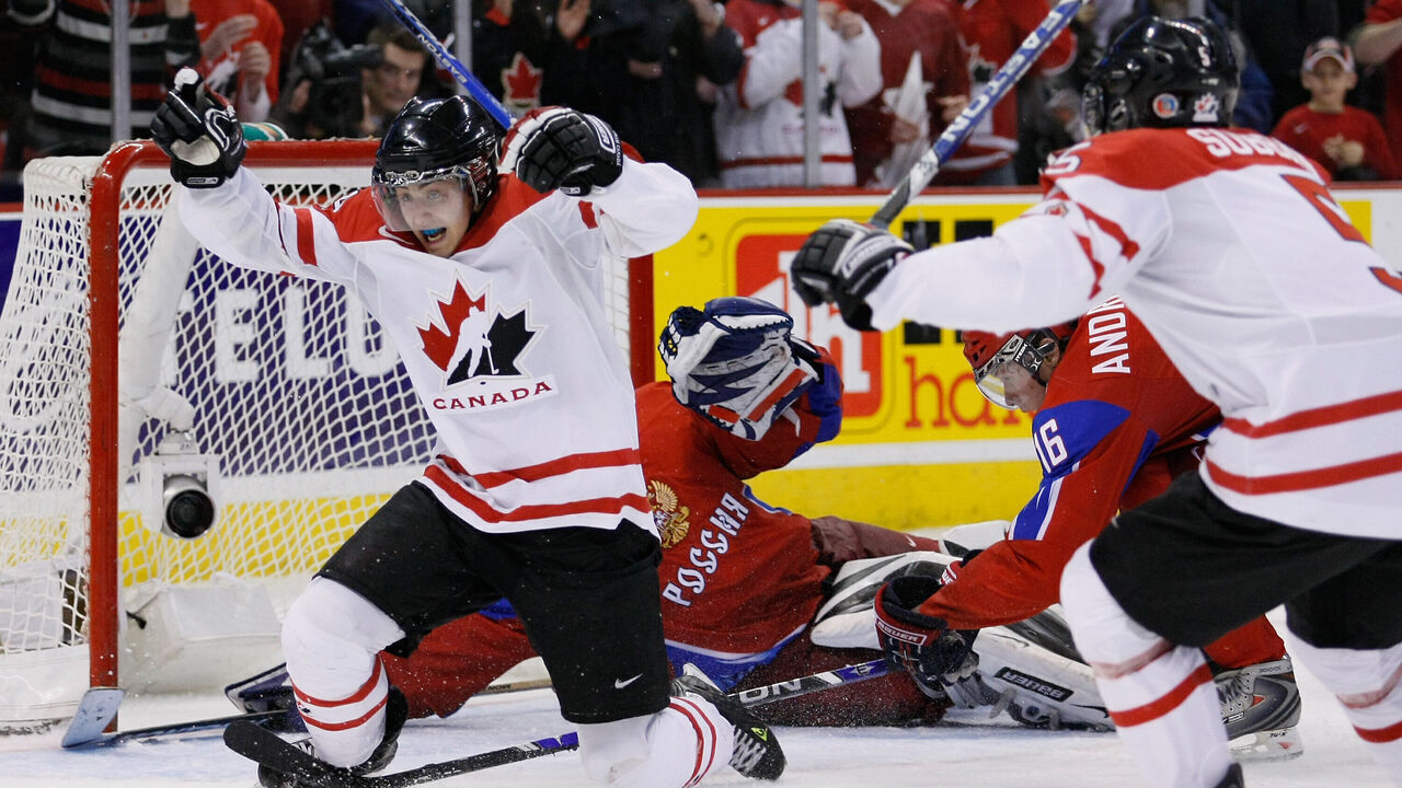 OTTAWA, ON - JANUARY 3: Jordan Eberle #14 of Team Canada reacts after having scored the tying goal on Vadim Zhelobnyuk #1 of Team Russia forcing overtime during the semifinals at the IIHF World Junior Championships at the Ottawa Civic Centre on January 03, 2009 in Ottawa, Ontario, Canada. Team Canada defeated Team Russia 6-5 in a shootout.