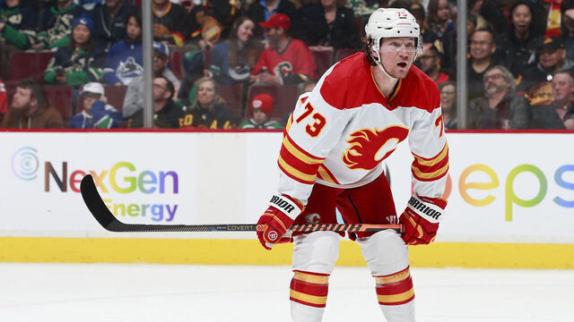 VANCOUVER, CANADA - MARCH 31: Tyler Toffoli #73 of the Calgary Flames lines up for a face-off during their NHL game against the Vancouver Canucks at Rogers Arena March 31, 2023 in Vancouver, British Columbia, Canada.