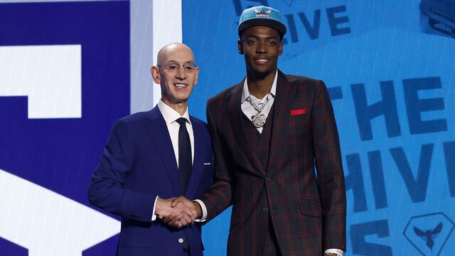 NEW YORK, NEW YORK - JUNE 22: Brandon Miller (R) poses with NBA commissioner Adam Silver (L) after being drafted second overall pick by the Charlotte Hornets during the first round of the 2023 NBA Draft at Barclays Center on June 22, 2023 in the Brooklyn borough of New York City.