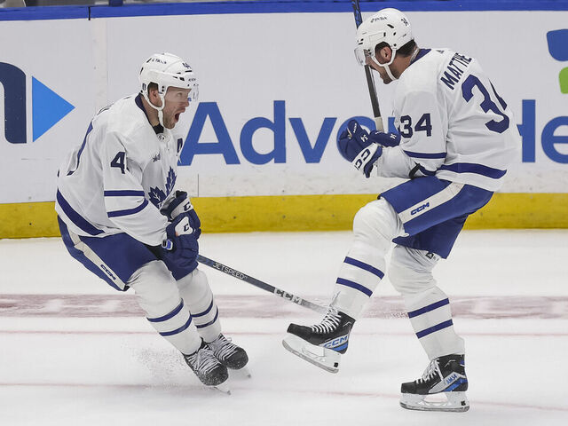 TAMPA, FL - APRIL 22: Auston Matthews #34 of the Toronto Maple Leafs celebrates a goal with teammate Morgan Rielly #44 against the Tampa Bay Lightning in Game Three of the First Round of the 2023 Stanley Cup Playoffs at Amalie Arena on April 22, 2023 in Tampa, Florida.