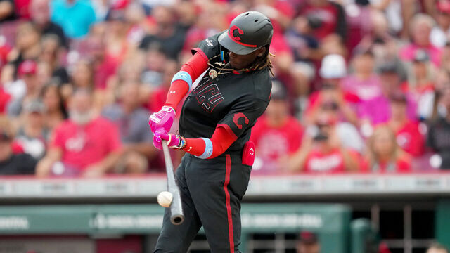 CINCINNATI, OHIO - JUNE 23: Elly De La Cruz #44 of the Cincinnati Reds hits a double in the second inning against the Atlanta Braves at Great American Ball Park on June 23, 2023 in Cincinnati, Ohio.