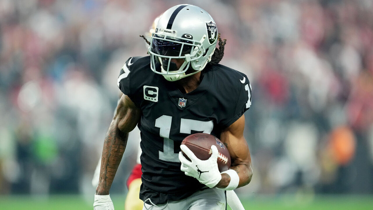 LAS VEGAS, NEVADA - JANUARY 01: Davante Adams #17 of the Las Vegas Raiders rushes for a touchdown against the San Francisco 49ers during the third quarter at Allegiant Stadium on January 01, 2023 in Las Vegas, Nevada.