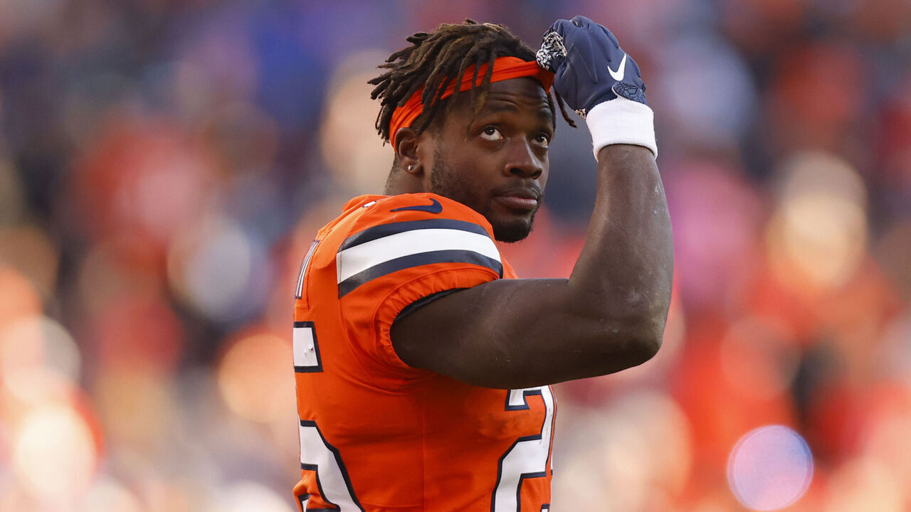 DENVER, COLORADO - NOVEMBER 20: Melvin Gordon III #25 of the Denver Broncos walks off the field after fumbling the football in the second quarter of a game against the Las Vegas Raiders at Empower Field At Mile High on November 20, 2022 in Denver, Colorado.