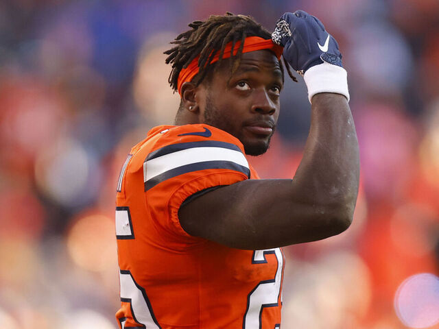DENVER, COLORADO - NOVEMBER 20: Melvin Gordon III #25 of the Denver Broncos walks off the field after fumbling the football in the second quarter of a game against the Las Vegas Raiders at Empower Field At Mile High on November 20, 2022 in Denver, Colorado.
