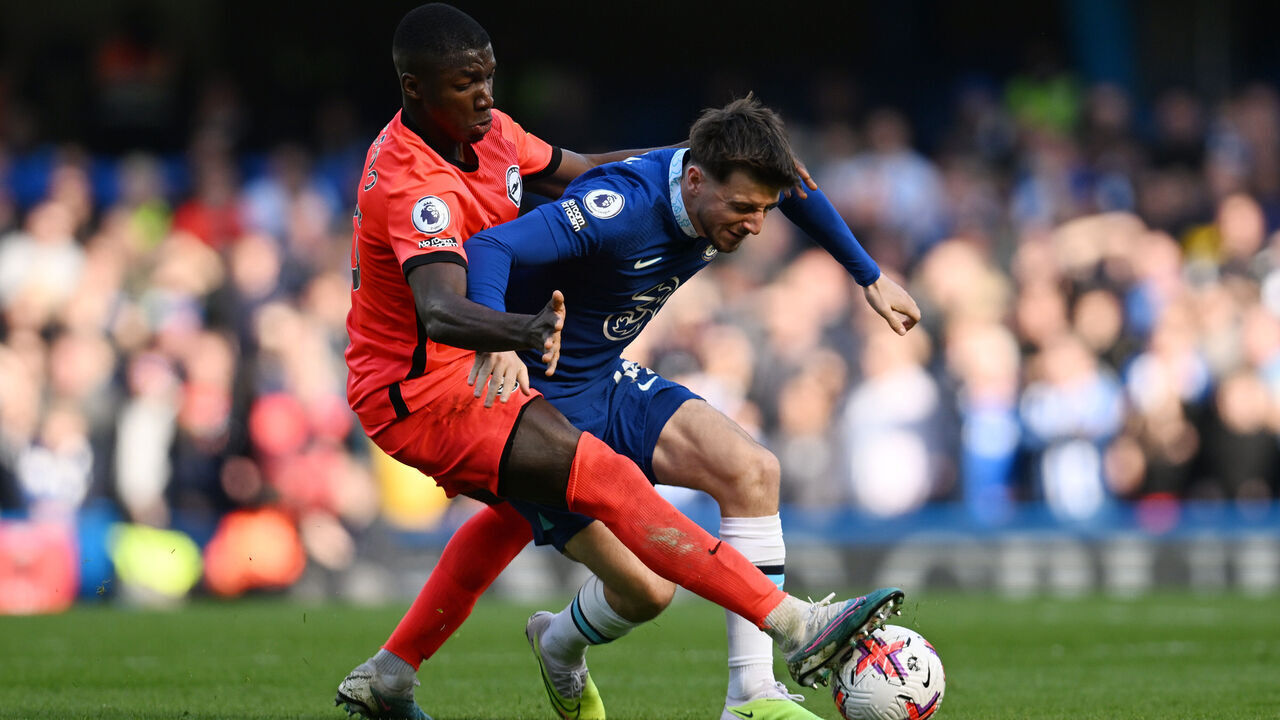 LONDON, ENGLAND - APRIL 15: Moises Caicedo of Brighton & Hove Albion tackles Mason Mount of Chelsea during the Premier League match between Chelsea FC and Brighton & Hove Albion at Stamford Bridge on April 15, 2023 in London, England.