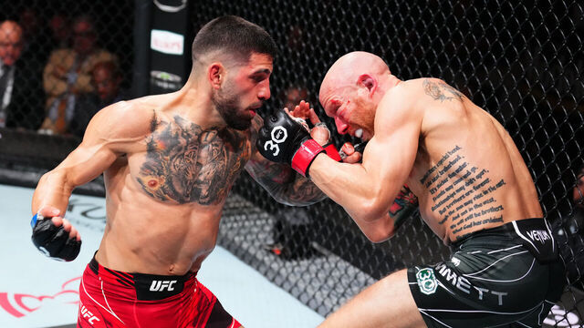 JACKSONVILLE, FLORIDA - JUNE 24: (L-R) Ilia Topuria of Germany punches Josh Emmett in their featherweight fight during the UFC Fight Night event at Vystar Veterans Memorial Arena on June 24, 2023 in Jacksonville, Florida.