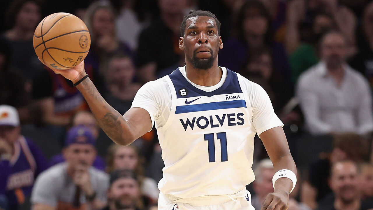 PHOENIX, ARIZONA - MARCH 29: Naz Reid #11 of the Minnesota Timberwolves handles the ball during the second half of the NBA game at Footprint Center on March 29, 2023 in Phoenix, Arizona. The Suns defeated the Timberwolves 107-100.
