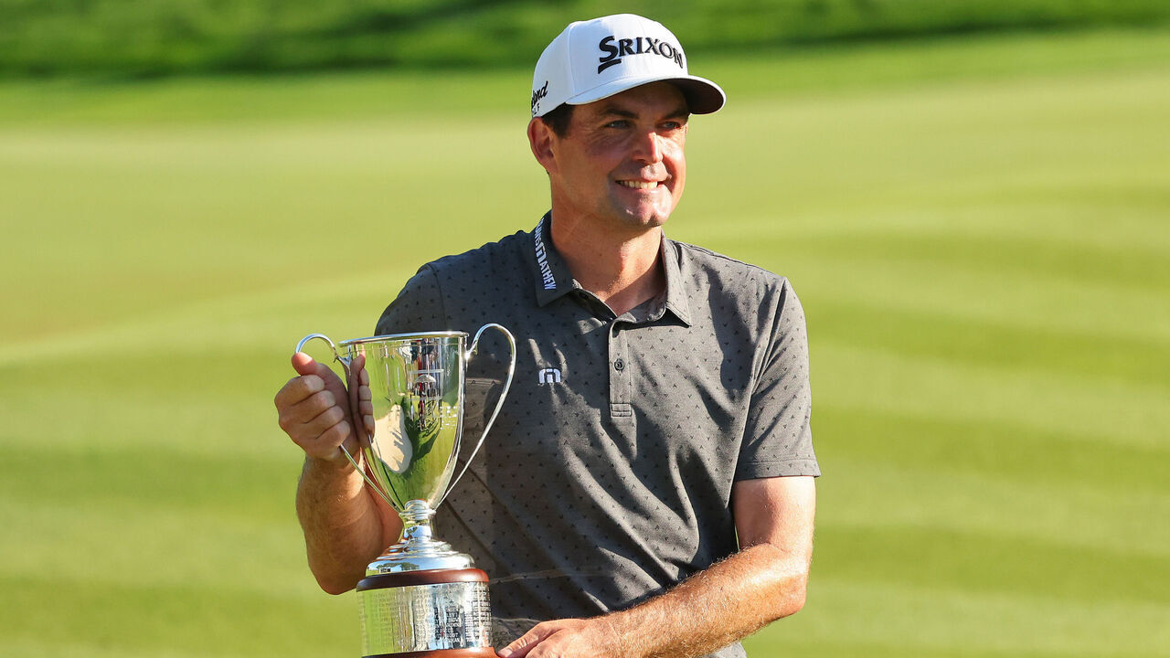 CROMWELL, CONNECTICUT - JUNE 25: Keegan Bradley of the United States celebrates with the trophy after winning the final round of the Travelers Championship at TPC River Highlands on June 25, 2023 in Cromwell, Connecticut.