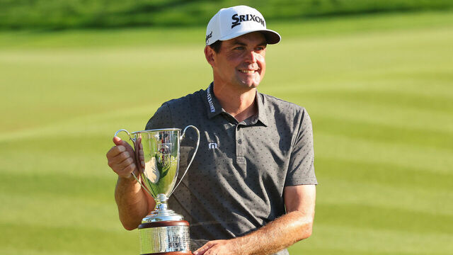 CROMWELL, CONNECTICUT - JUNE 25: Keegan Bradley of the United States celebrates with the trophy after winning the final round of the Travelers Championship at TPC River Highlands on June 25, 2023 in Cromwell, Connecticut.