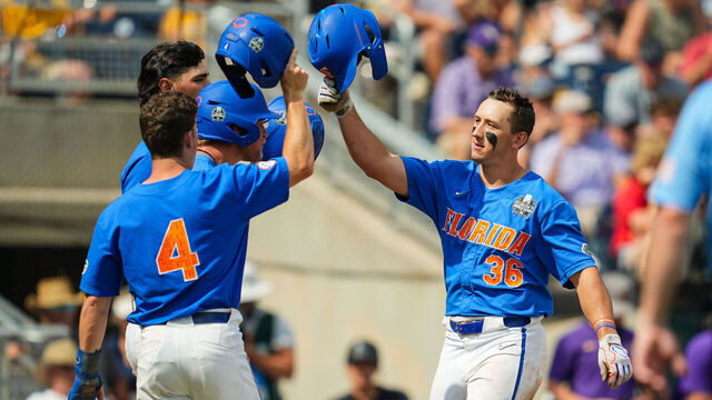 OMAHA, NEBRASKA - JUNE 25: Wyatt Langford #36 of the Florida Gators celebrates with teammates after hitting a three-run home run during the sixth inning of Game 2 of the NCAA College World Series baseball finals against the LSU Tigers at Charles Schwab Field on June 25, 2023 in Omaha, Nebraska.