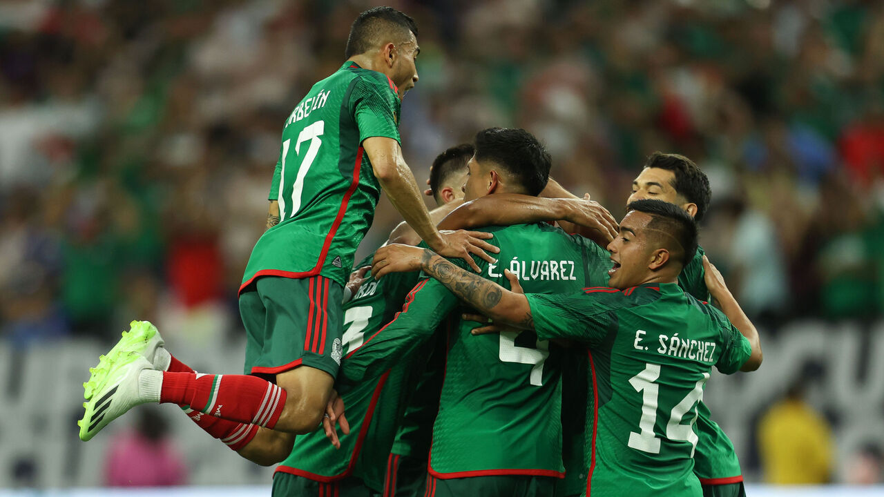 HOUSTON, TEXAS - JUNE 25: Luis Romo #7 of Mexico celebrates with teammates after scoring the team´s second goal during a Group B match between Mexico and Honduras at NRG Stadium on June 25, 2023 in Houston, Texas.