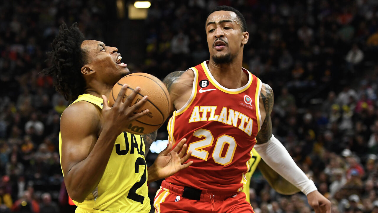SALT LAKE CITY, UTAH - FEBRUARY 03: John Collins #20 of the Atlanta Hawks defends Collin Sexton #2 of the Utah Jazz during the first half of a game at Vivint Arena on February 03, 2023 in Salt Lake City, Utah.