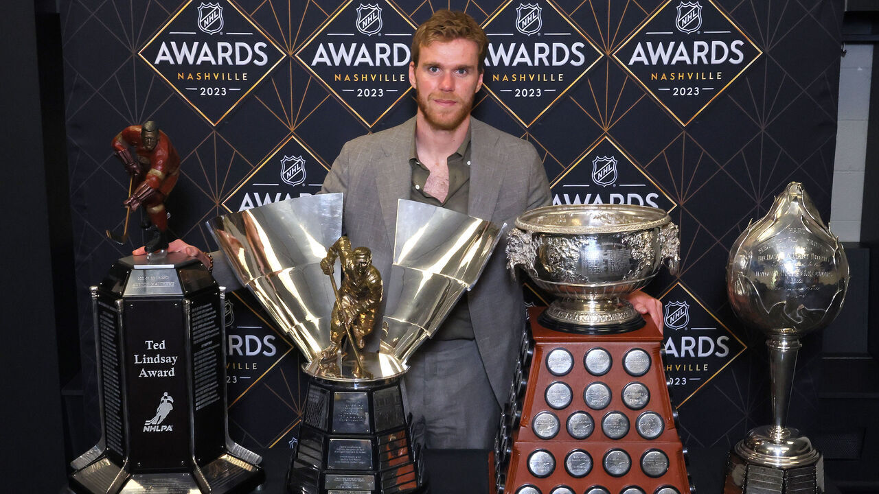 NASHVILLE, TENNESSEE - JUNE 26: Connor McDavid of the Edmonton Oilers poses with the Ted Lindsay Award, Maurice Richard Trophy, Art Ross Trophy and the Hart Trophy during the 2023 NHL Awards at Bridgestone Arena on June 26, 2023 in Nashville, Tennessee.