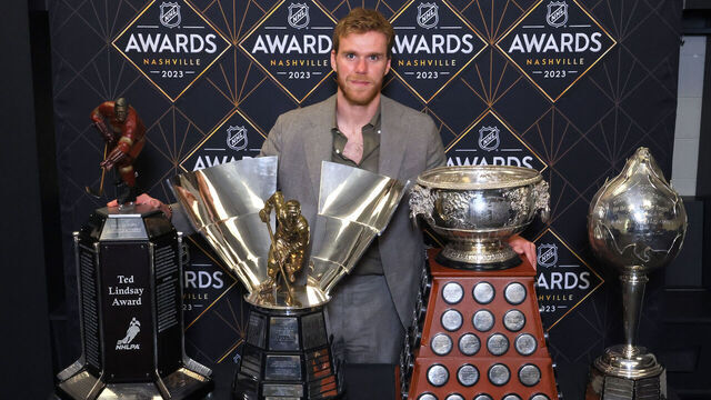 NASHVILLE, TENNESSEE - JUNE 26: Connor McDavid of the Edmonton Oilers poses with the Ted Lindsay Award, Maurice Richard Trophy, Art Ross Trophy and the Hart Trophy during the 2023 NHL Awards at Bridgestone Arena on June 26, 2023 in Nashville, Tennessee.
