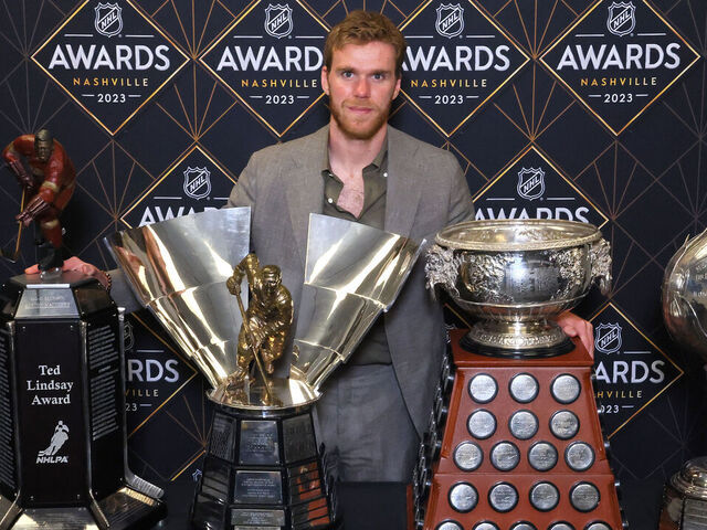 NASHVILLE, TENNESSEE - JUNE 26: Connor McDavid of the Edmonton Oilers poses with the Ted Lindsay Award, Maurice Richard Trophy, Art Ross Trophy and the Hart Trophy during the 2023 NHL Awards at Bridgestone Arena on June 26, 2023 in Nashville, Tennessee.