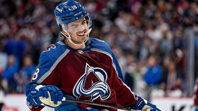 DENVER, COLORADO - APRIL 11: Alex Newhook #18 of the Colorado Avalanche looks on in the second period of a game against the Edmonton Oilers at Ball Arena on April 11, 2023 in Denver, Colorado.