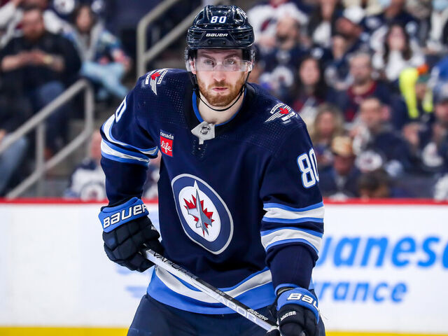 WINNIPEG, CANADA - APRIL 8: Pierre-Luc Dubois #80 of the Winnipeg Jets looks on during a third period stoppage in play against the Nashville Predators at the Canada Life Centre on April 8, 2023 in Winnipeg, Manitoba, Canada. The Jets shutout the Preds 2-0.