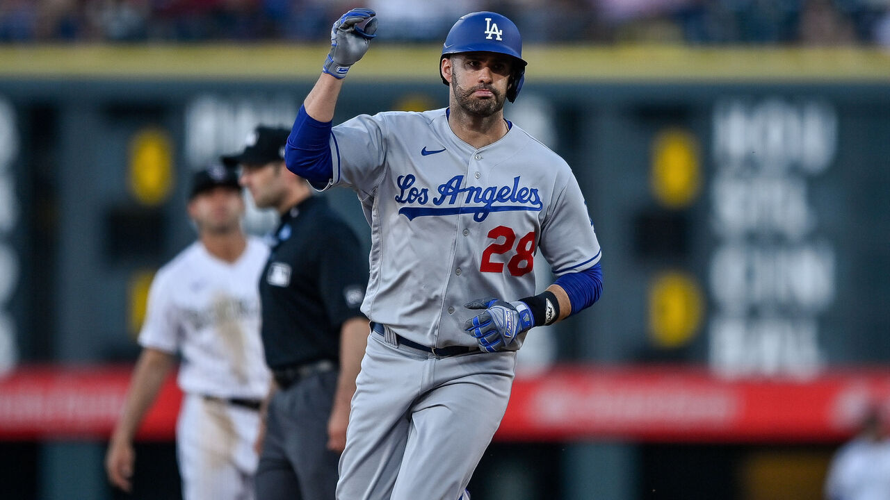 DENVER, CO - JUNE 27: Los Angeles Dodgers designated hitter J.D. Martinez #28 rounds the bases after hitting a sixth inning solo homerun during a game between the Los Angeles Dodgers and the Colorado Rockies at Coors Field on June 27, 2023 in Denver, Colorado.