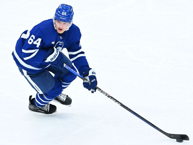 TORONTO, ON - MARCH 13: Toronto Maple Leafs center David Kampf (64) controls the puck on his stick in the second period during the NHL regular season game between the Buffalo Sabres and the Toronto Maple Leafs on March 13, 2023 at Scotiabank Arena in Toronto, ON.