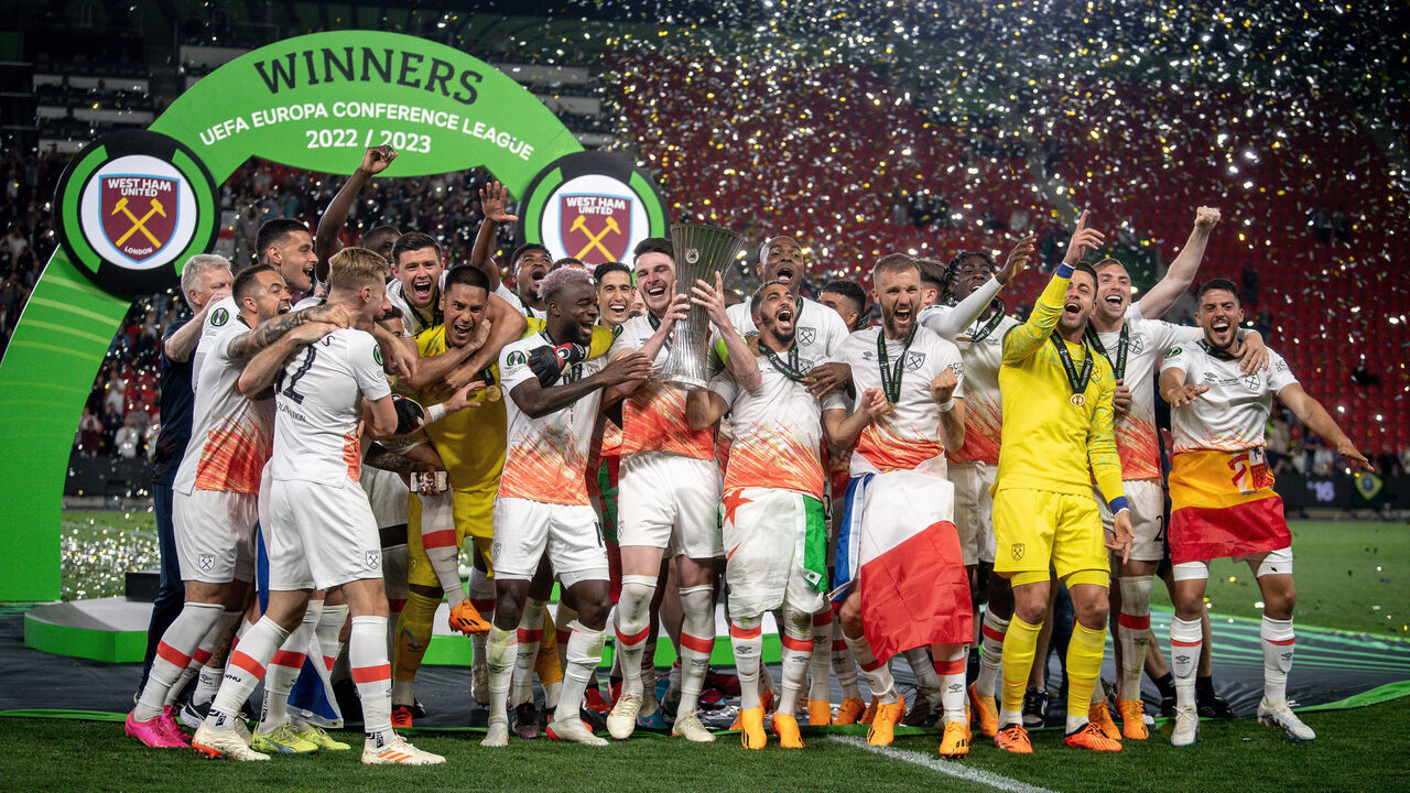PRAGUE, CZECH REPUBLIC - JUNE 7: West Ham United team captain Declan Rice (C), with team, lift the trophy after winning the Europa Conference Football League match between West Ham United and Fiorentina, at the Fortuna Arena in Prague, Czech Republic on June 7, 2023.