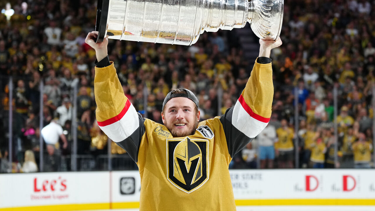 LAS VEGAS, NEVADA - JUNE 13: Ivan Barbashev #49 of the Vegas Golden Knights celebrates with the Stanley Cup after a 9-3 victory against the Florida Panthers in Game Five of the 2023 NHL Stanley Cup Final at T-Mobile Arena on June 13, 2023 in Las Vegas, Nevada.