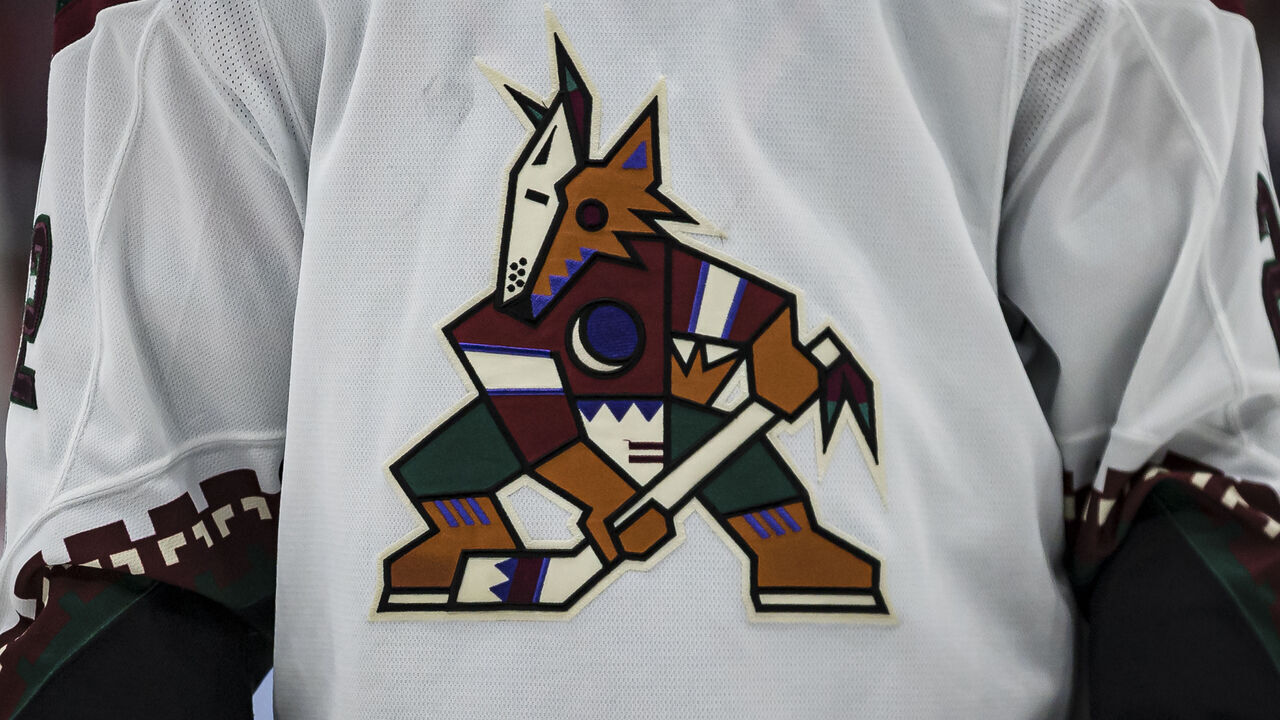 WASHINGTON, DC - OCTOBER 29: A detailed view of the Arizona Coyotes logo on the jersey worn by Johan Larsson #22 of the Arizona Coyotes during the third period of the game against the Washington Capitals at Capital One Arena on October 29, 2021 in Washington, DC.