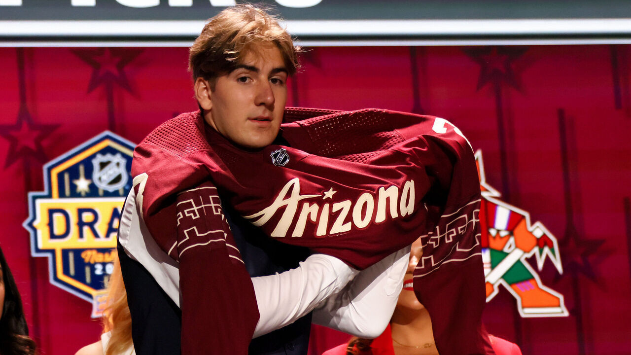 NASHVILLE, TENNESSEE - JUNE 28: Dmitriy Simashev is selected by the Arizona Coyotes with the sixth overall pick during round one of the 2023 Upper Deck NHL Draft at Bridgestone Arena on June 28, 2023 in Nashville, Tennessee.