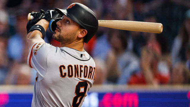 MINNEAPOLIS, MN - MAY 23: Michael Conforto #8 of the San Francisco Giants hits a two-run home run against the Minnesota Twins in the seventh inning at Target Field on May 23, 2023 in Minneapolis, Minnesota. The Giants defeated the Twins 4-3.