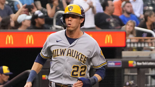 FLUSHING, NY - JUNE 28: Milwaukee Brewers Left Fielder Christian Yelich (22) scores a run on Milwaukee Brewers Designated Hitter Jesse Winker (not pictured) RBI double during the first inning of a Major League Baseball game between the Milwaukee Brewers and New York Mets on June 29, 2023, at Citi Field in Flushing, NY.