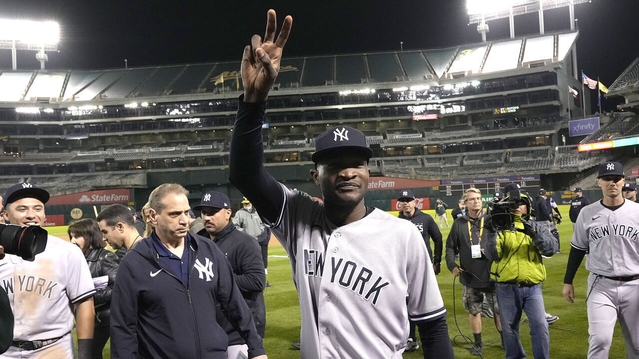 OAKLAND, CALIFORNIA - JUNE 28: Domingo German #0 of the New York Yankees celebrates his no-hit perfect game against the Oakland Athletics, defeating them 11-0 at RingCentral Coliseum on June 28, 2023 in Oakland, California.