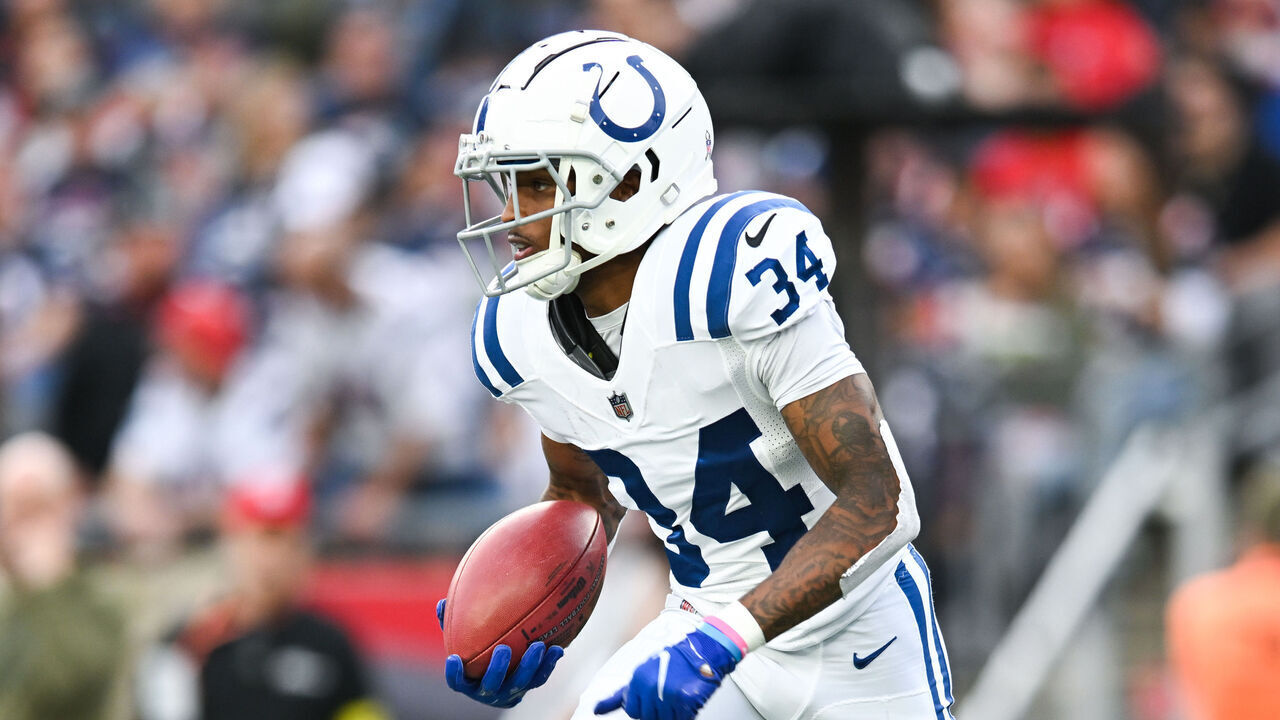FOXBOROUGH, MA - NOVEMBER 6, 2022: Isaiah Rodgers Sr. #34 runs with the football during a game against the New England Patriots at Gillette Stadium on November 6, 2022 in Foxborough, Massachusetts.