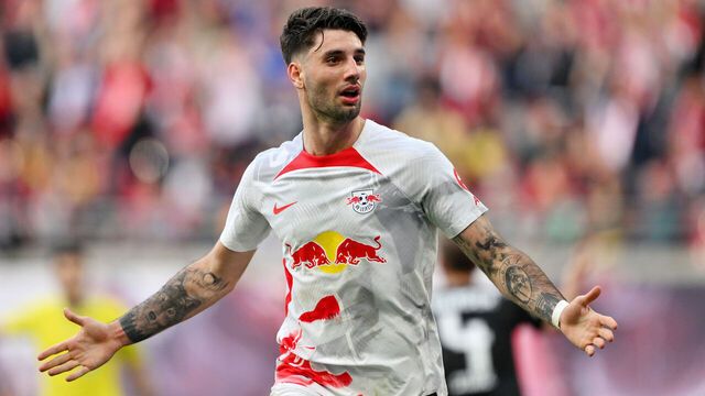 LEIPZIG, GERMANY - MAY 14: Dominik Szoboszlai of RB Leipzig celebrates after scoring the team's second goal during the Bundesliga match between RB Leipzig and SV Werder Bremen at Red Bull Arena on May 14, 2023 in Leipzig, Germany.