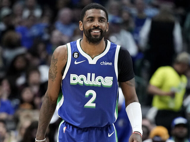 DALLAS, TEXAS - MARCH 24: Kyrie Irving #2 of the Dallas Mavericks looks on during the second half against the Charlotte Hornets at American Airlines Center on March 24, 2023 in Dallas, Texas. NOTE TO USER: User expressly acknowledges and agrees that, by downloading and/or using this Photograph, user is consenting to the terms and conditions of the Getty Images License Agreement.